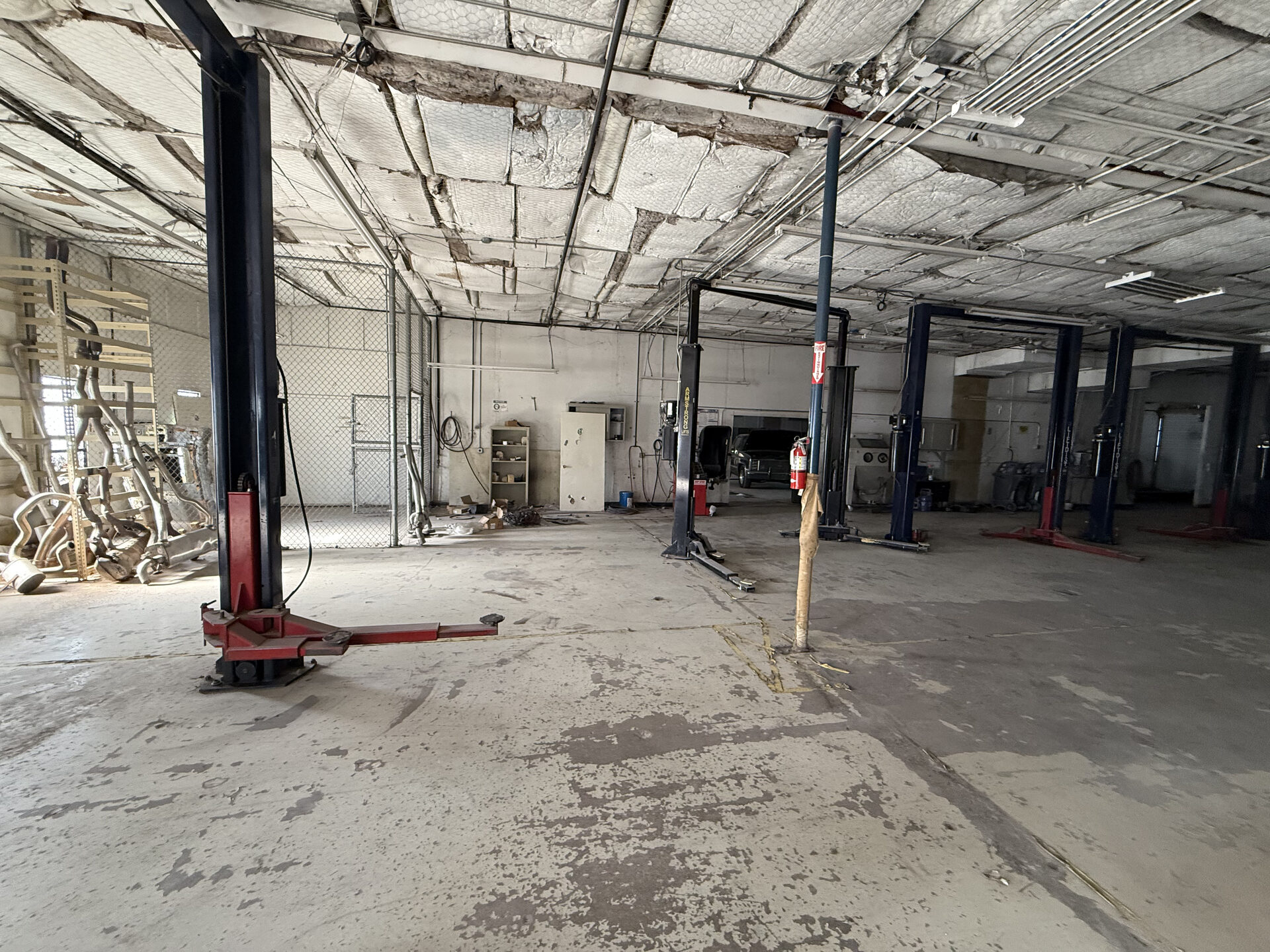 400 Bishop Ave before renovation — existing light industrial interior before renovation, Richardson TX