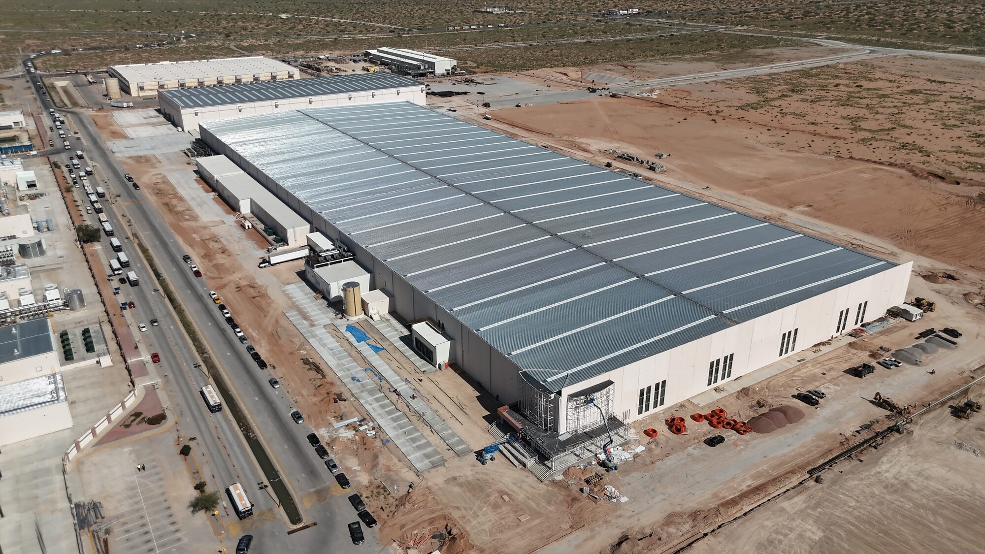 Foxconn manufacturing campus — aerial overview of large-scale industrial construction, Ciudad Juárez Mexico