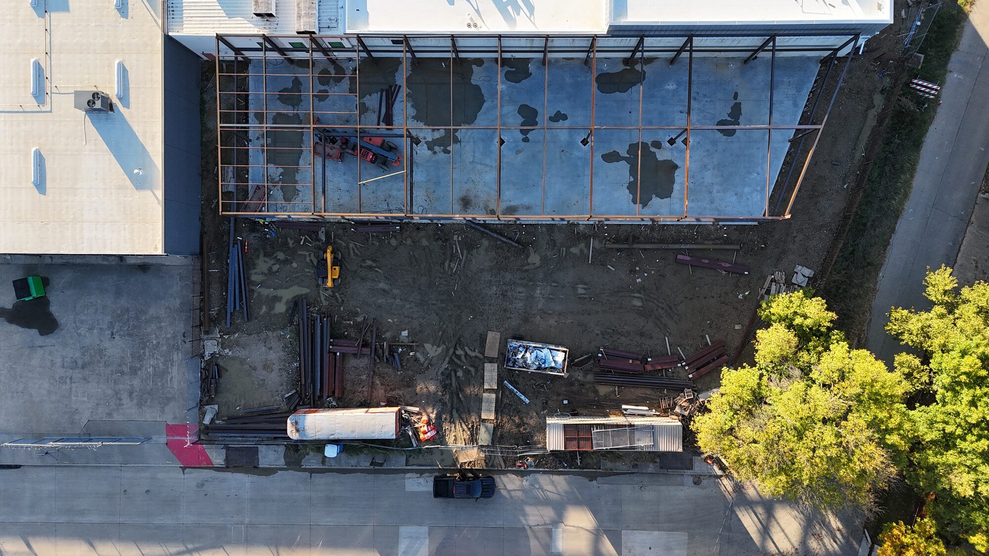 4767 Iberia construction progress — aerial view of steel frame layout on the concrete slab, Dallas TX